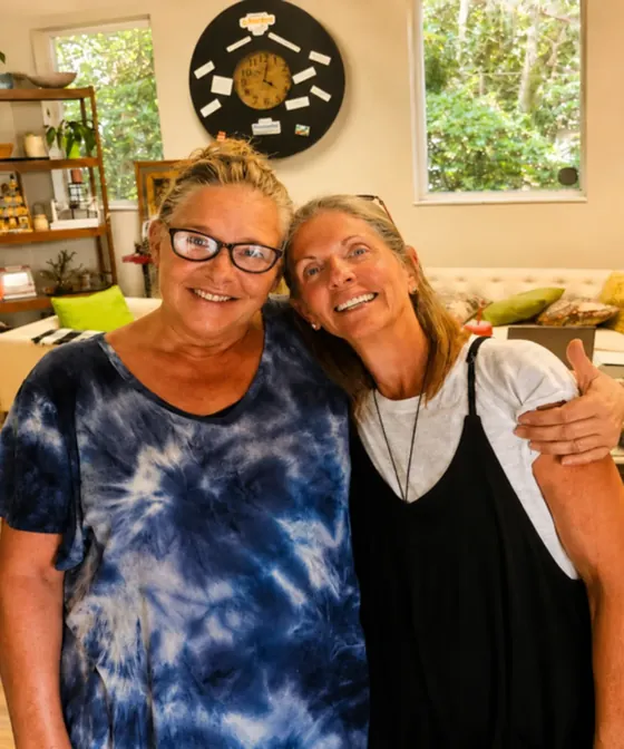 Yolanda with a guest inside a Banner Harvest store