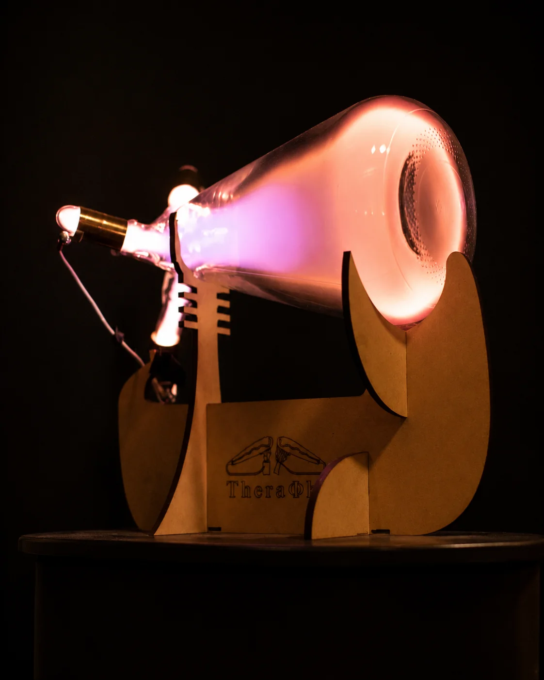 Glowing Theraphi plasma tube emitter at Banner Harvest